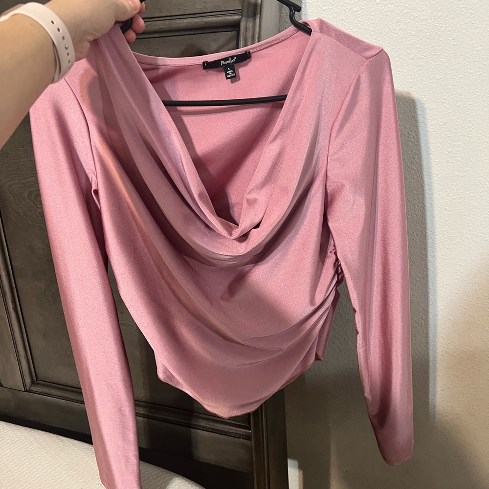 Cute pink long sleeve top. Size large, very stretchy and comfortable to wear.